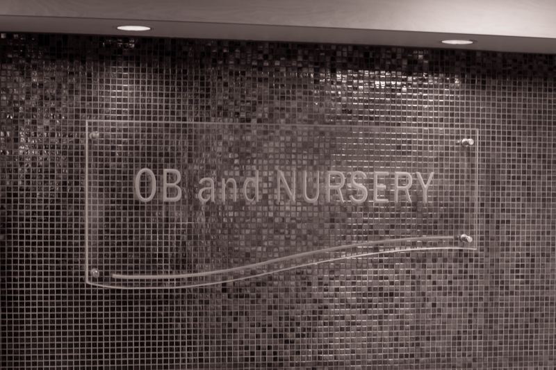 The OB and Nursery sign on the wall of the ward
